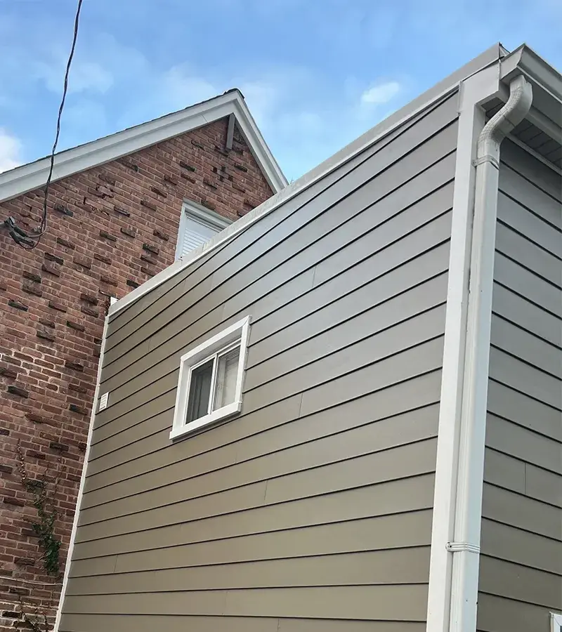 Brown metal standing seam roof installed in Millersville, MD.