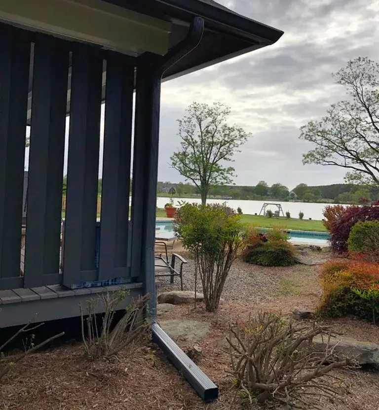 Black gutters and downspouts in Stevensville, MD.