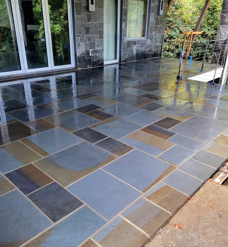A flagstone patio with overhang.
