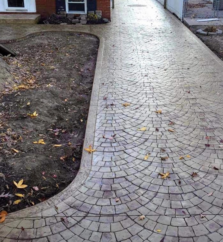 A cobblestone look-alike stamped concrete patio in Millersville, MD.