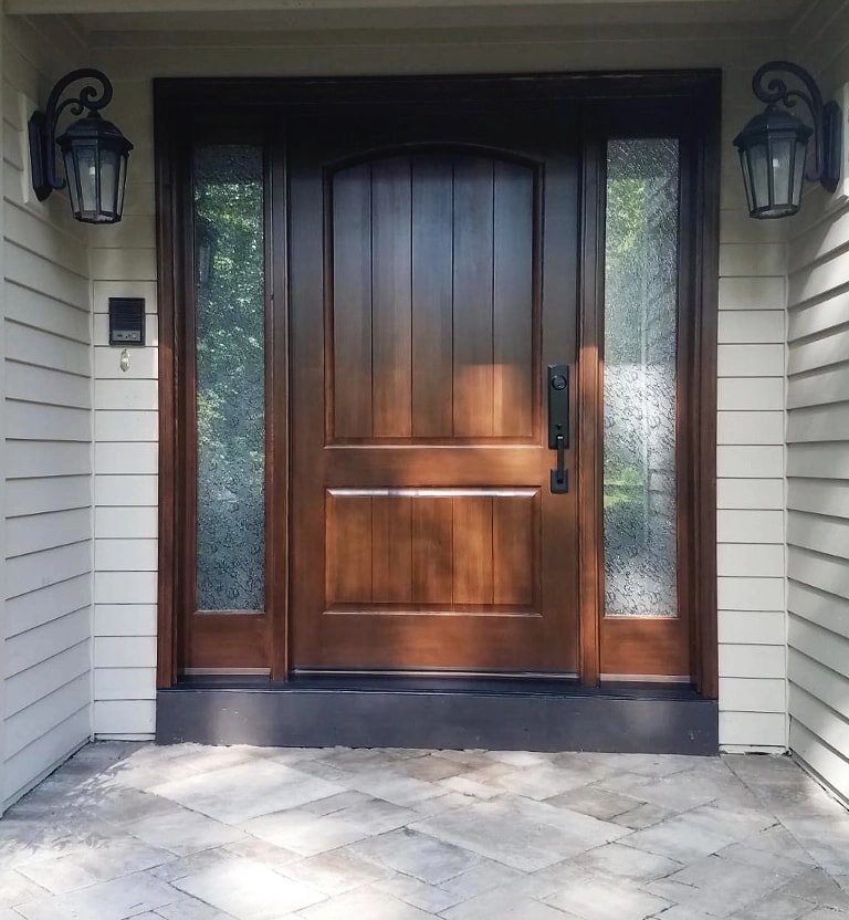 A pre-finished fiberglass front entry replacement door installed in Bowie, MD.