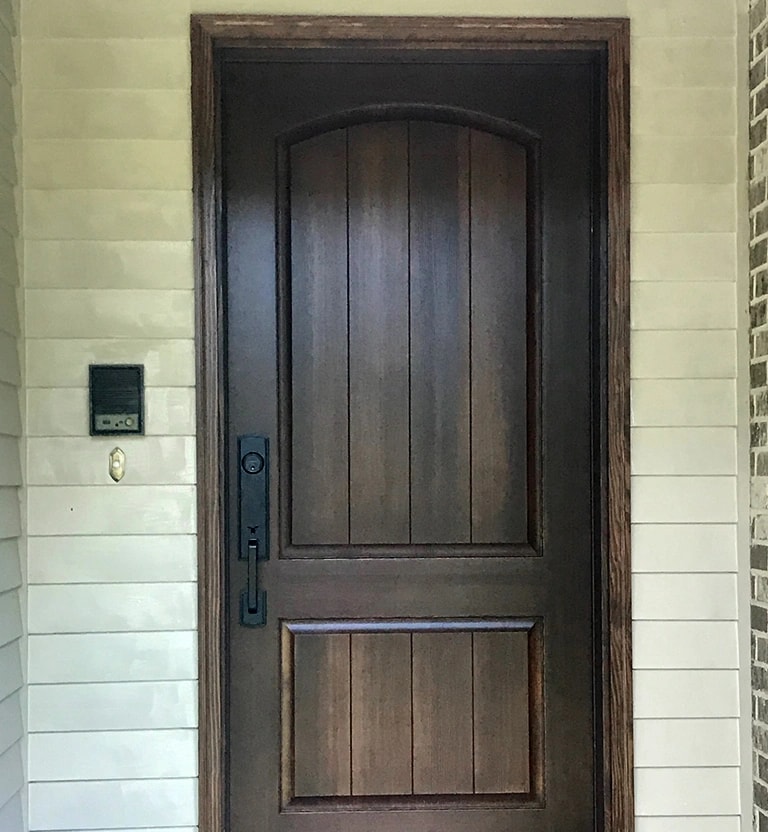A realistic wood looking fiberglass front entry replacement door installed in Rockville, MD.