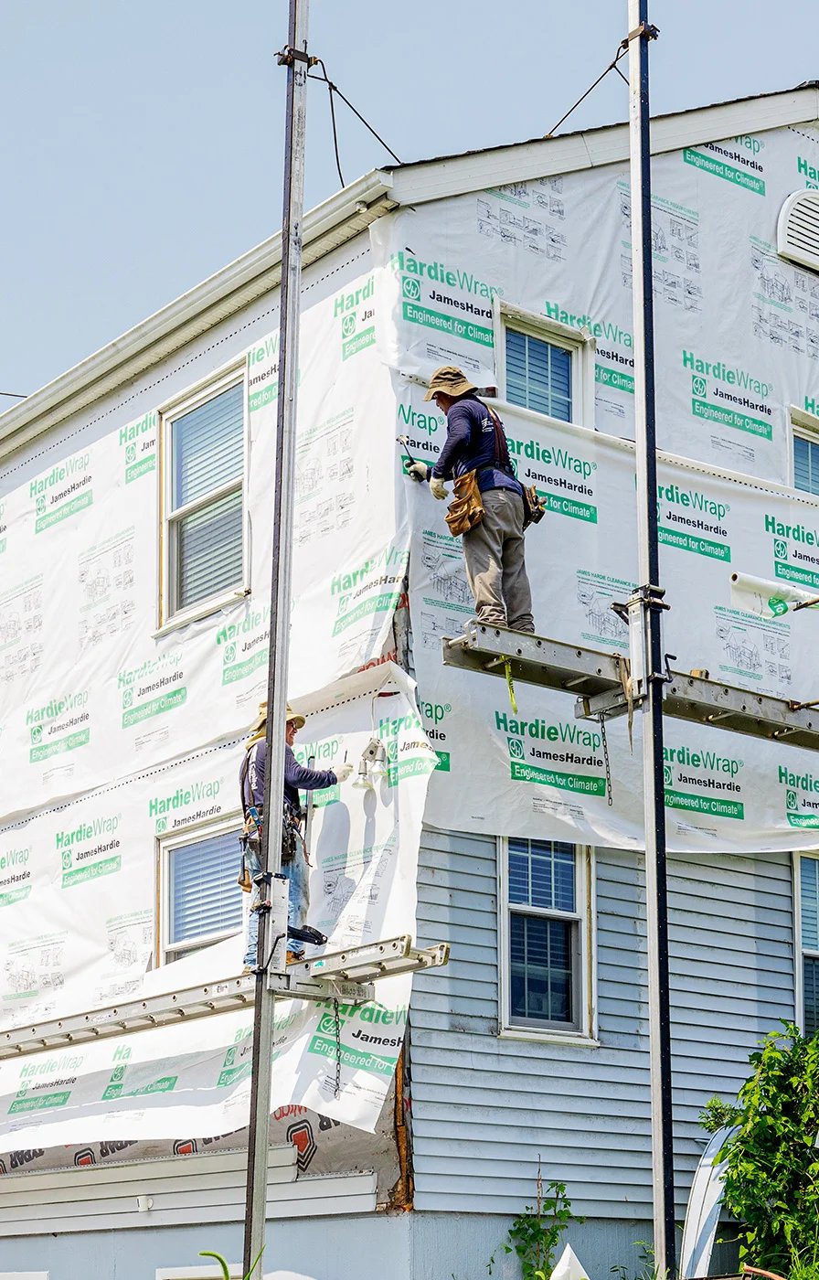 Tear off photos of a new siding project. 