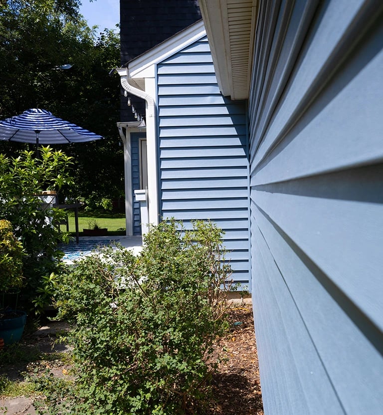 A seamless blue siding panel. 