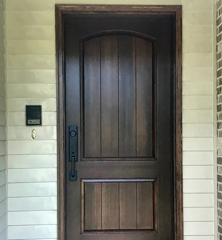 A realistic wood looking fiberglass front entry replacement door installed in Rockville, MD.