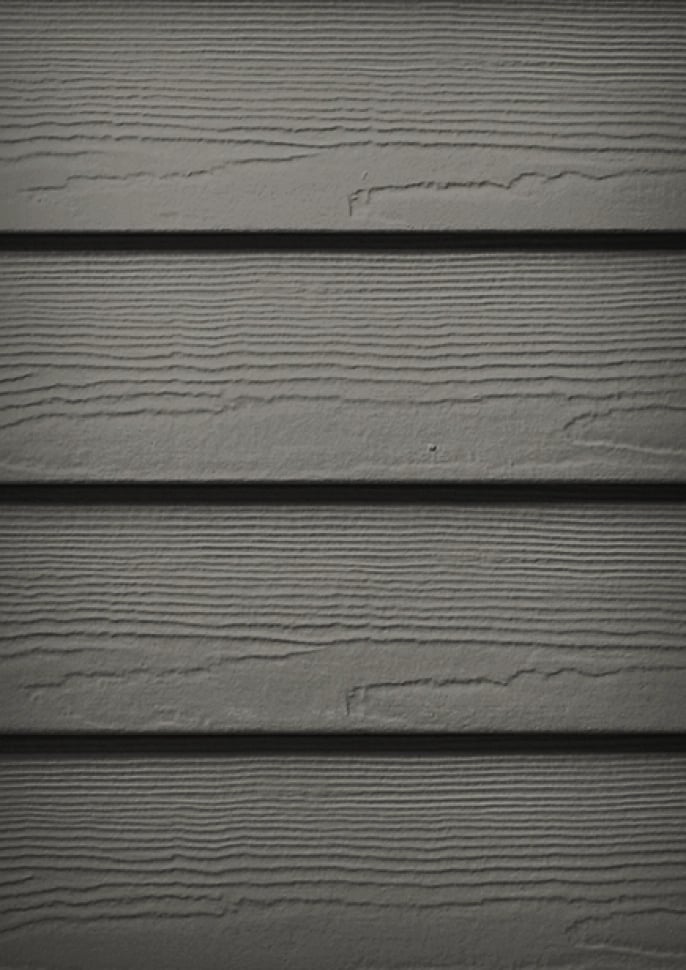 James Hardie Aged Pewter plank siding on a home's exterior