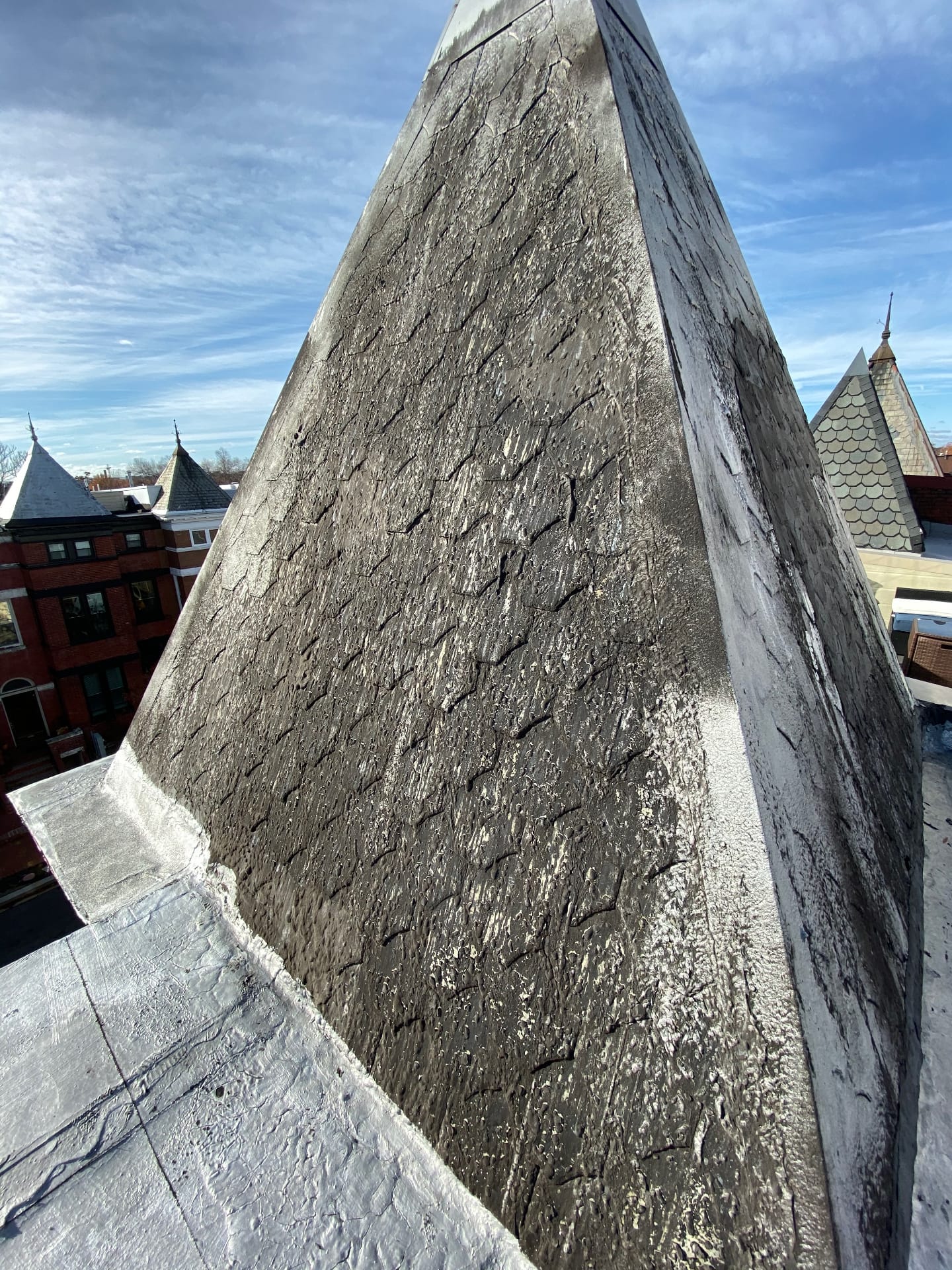 Before — A century of weather — scalloped slate turret restoration in Washington DC by Capitol Improvements