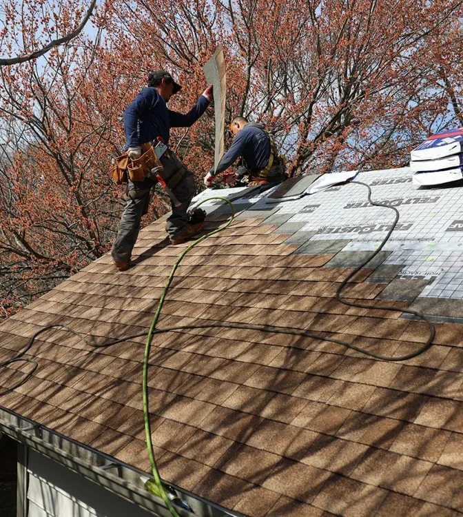 Installation photos of a new GAF Timberline HDZ Shakewood color roof.